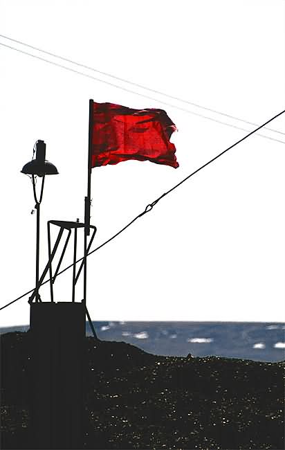      (  ) - Red Flag Over the Pile of Coal (from the Chuko