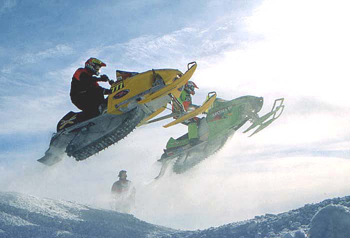 two flying snowmobiles